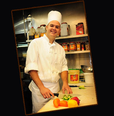 Martin Munoz slicing up fresh bell-peppers - Photo by Charles Guest of MemorablePlaces.com © Copyright 2012